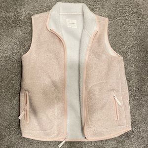 Pink zipper vest. White sherpa lined.